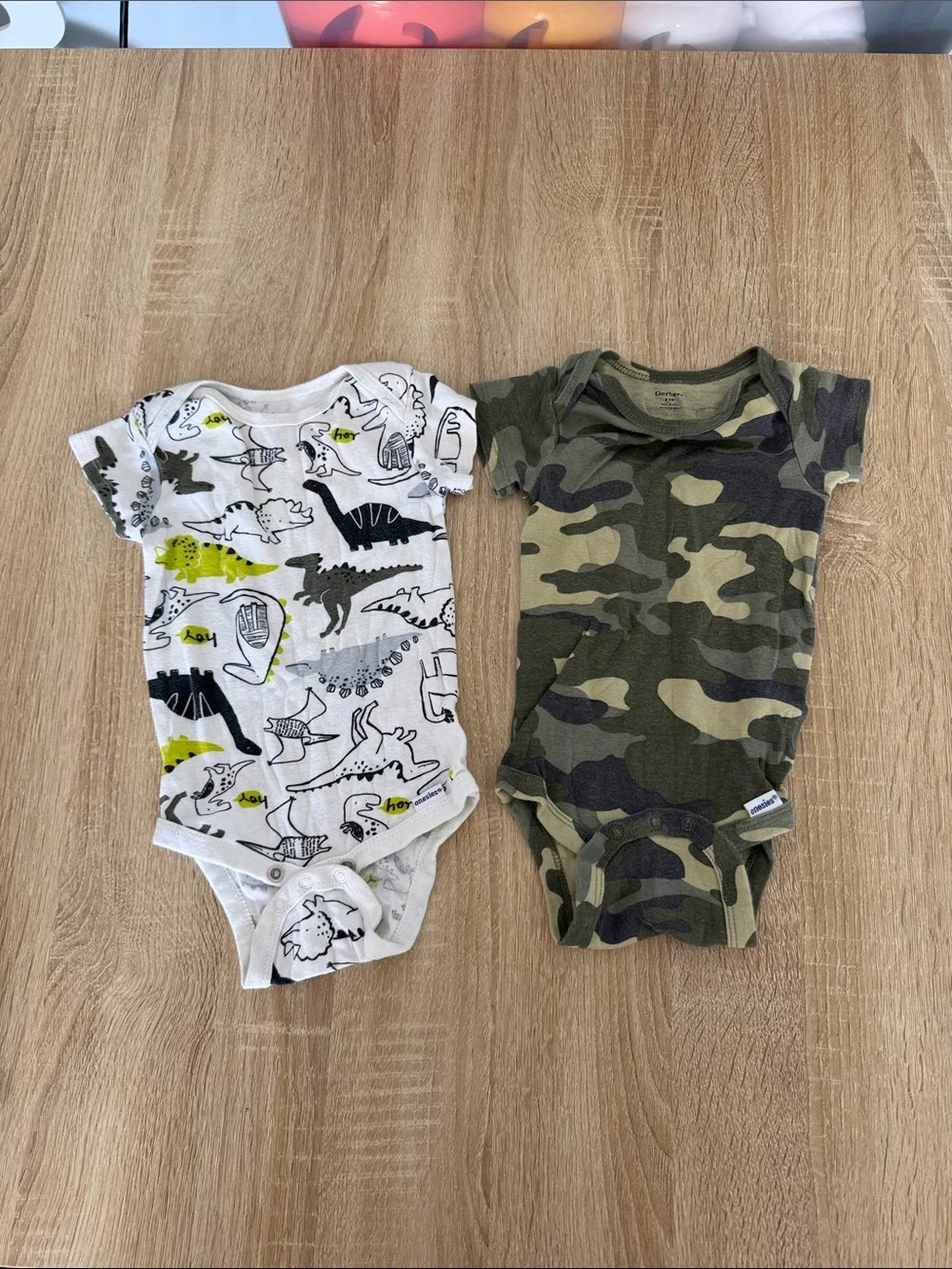Gerber White Dino Print & Green Camo Baby Onesies